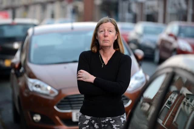 Builders skip on Horsley Hill Road caused Jennifer Hall to crash her car through low sun light