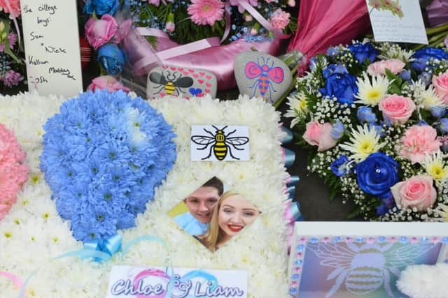 Chloe Rutherford and Liam Curry floral tribute at South Shields Town Hall memorial bench