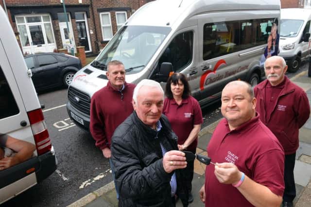 New mini bus for the Charles Young Centre. Driver Mark Scott (R) recives the keys from chairman Gordon Robertshaw