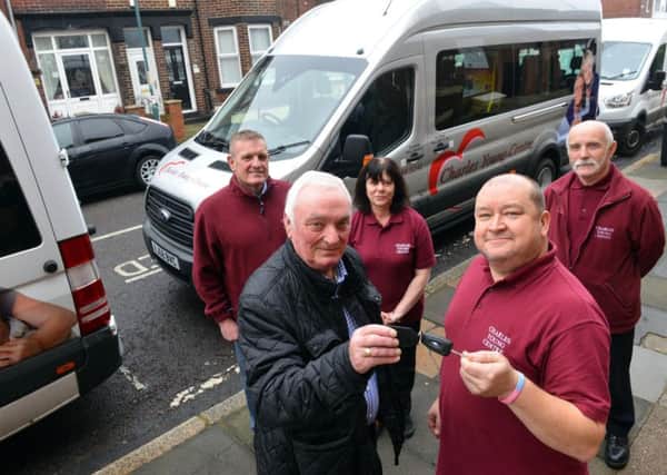 New mini bus for the Charles Young Centre. Driver Mark Scott (R) recives the keys from chairman Gordon Robertshaw