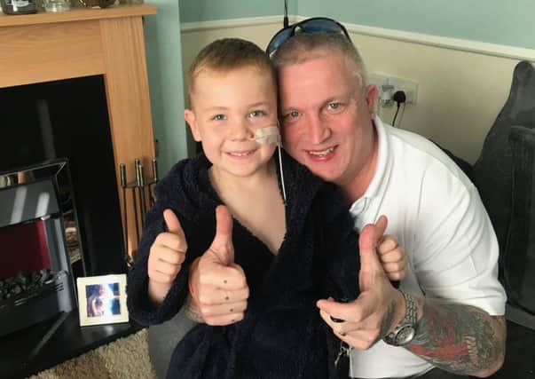 Kevin Hill of charity Bringing Back A Smile with Hartlepool youngster Leyton Anderson who is battling leukaemia.