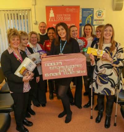 Wawn Street Surgery receptionist Nicola Porter and staff have been collecting for Hope and Hospitality food bank in South Shields.