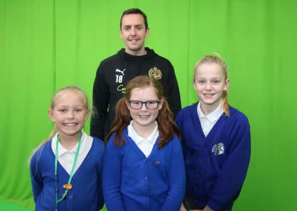 South Shields player Blair Adams with, from left, Westoe Crown pupils Penny Simpson, Molly Jewitt and Lillie Oliphant.