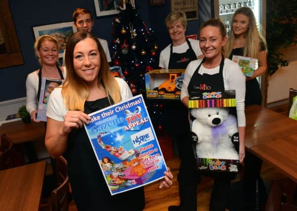 The Shields Gazette Toy Appeal with Caffe Mio owner Kathryn Savage with her staff.