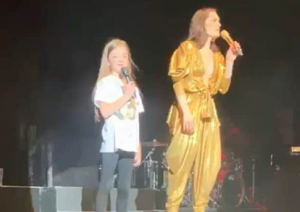Polly Sibbald on stage with Jessie J.