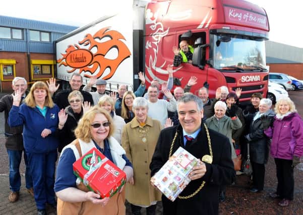 Operation Christmas Child shoebox appeal send off with orgainser Carol Hall and Mayor Ken Stephenson with volunteer team
