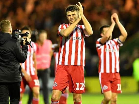 Sunderland defender Tom Flanagan is being linked with a move to the Championship