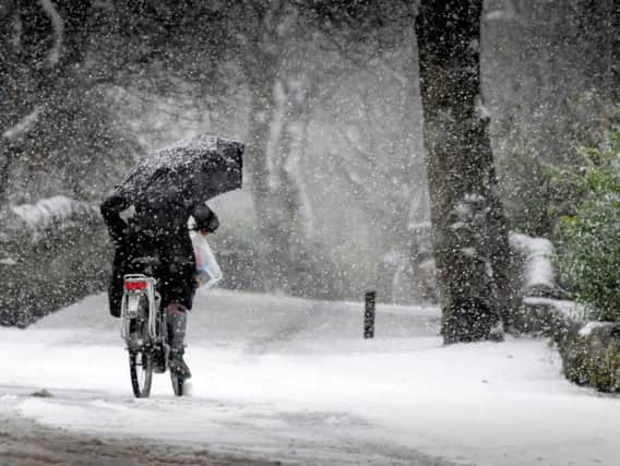 A cyclist in the snow at Cleadon Park