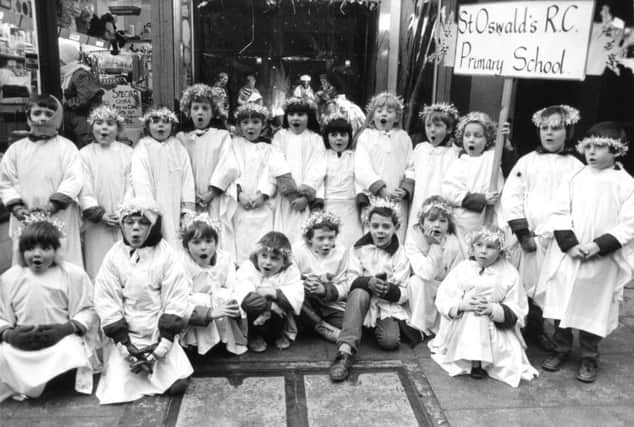 Pupils from St Oswalds RC Primary School performing a nativity play in 1986. Inset below, funnyman Ken Dodd.