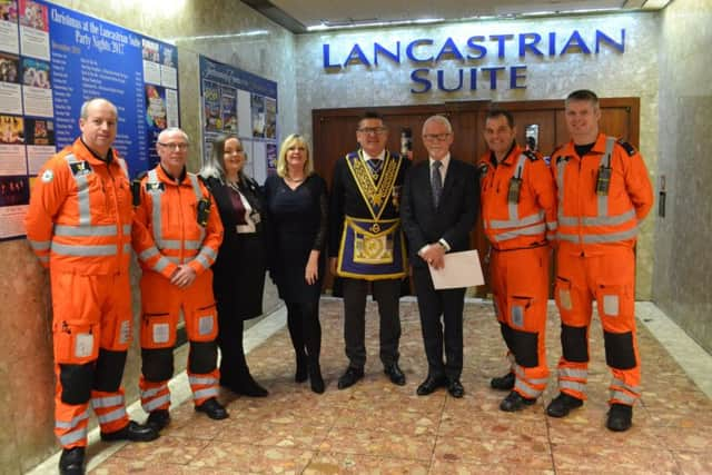 The Critical Care Team with (L to R Centre)  Hannah Powell, Public Liaison Officer, Mandy Drake, Deputy Director of Public Liaison, John Watts Chairman  of Durham Benevolence and Grahame Pickering the CEO of (GNAAS).