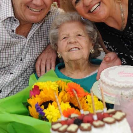 Jenny Gasston celebrates her 102nd birthday with son Stuart and partner Nancy Hogg.