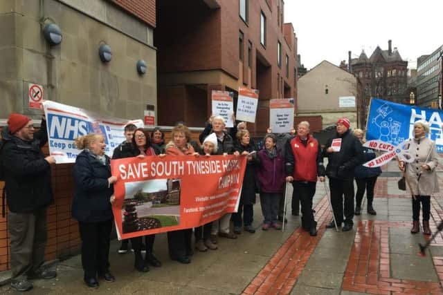 Protestors against the South Tyneside hospital services shake-up at the High Court in Leeds today.