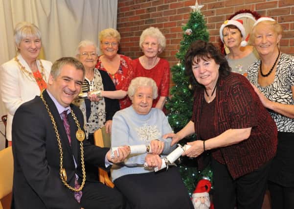 The Mayor Coun Ken Stephenson and Mayoress Cathy Stephenson join residents of Bamburgh Grove, Jarrow, at their Christmas party.