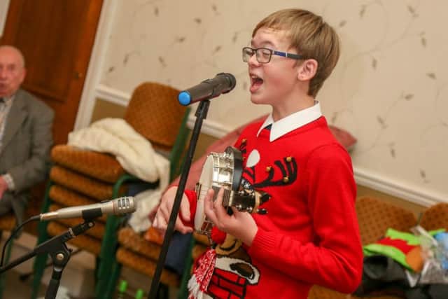 James Basset entertains at the Freemason's  Christmas Day for pensioners at the South Shields Masonic Hall 
 Picture by Tom Banks.