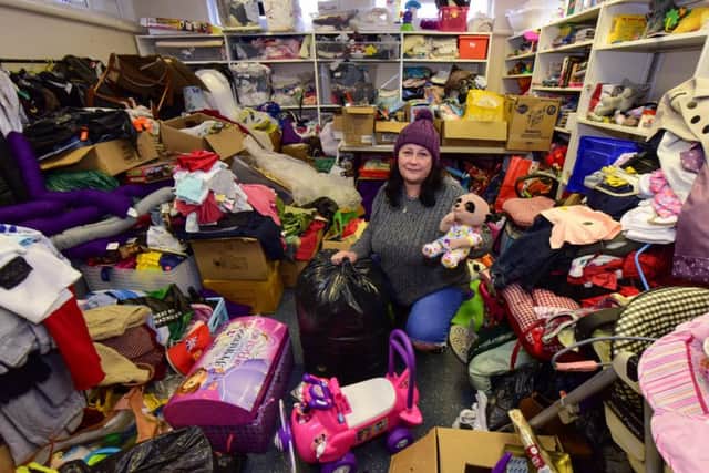 Jo Durkin of Hebburn Helps with items that have been donated for families in need, earlier this year
