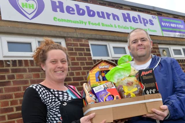 Richmond Taxis Steve Pippin easter egg donations to Hebburn Helps Angie Comerford