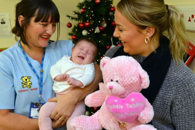 Shields Gazette Toy Appeal at South Tyneside District Hospital Childens Unit with the help from Hope 4 Kidz Shannon Crowder and nurse Kelly Hannah with baby Eliza Nygaard