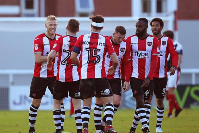 Jayden Stockley (left) looks set to leave Exeter City and join Portsmouth - despite links with Sunderland