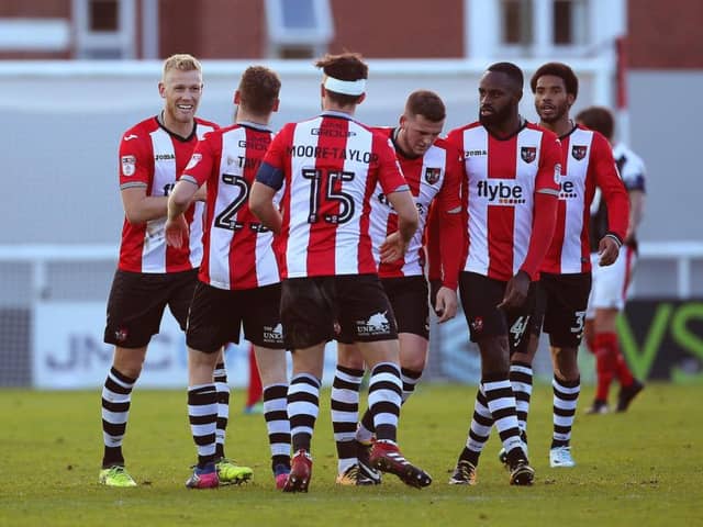Jayden Stockley (left) looks set to leave Exeter City and join Portsmouth - despite links with Sunderland