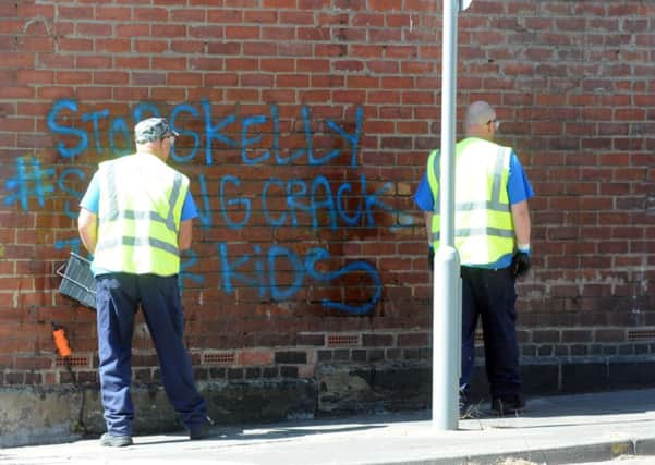 Workers clear up graffiti in South Eldon Street, South Shields.