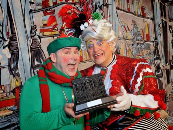 Santa's Naughty Little Elf Wayne Miller, left, and panto executive 
director Ray Spencer.