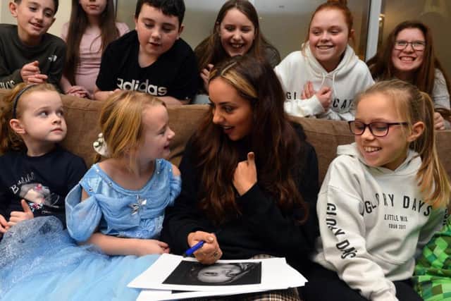 Little Mix star Jade Thirwall visits youngsters at Cancer Connections in South Shields.