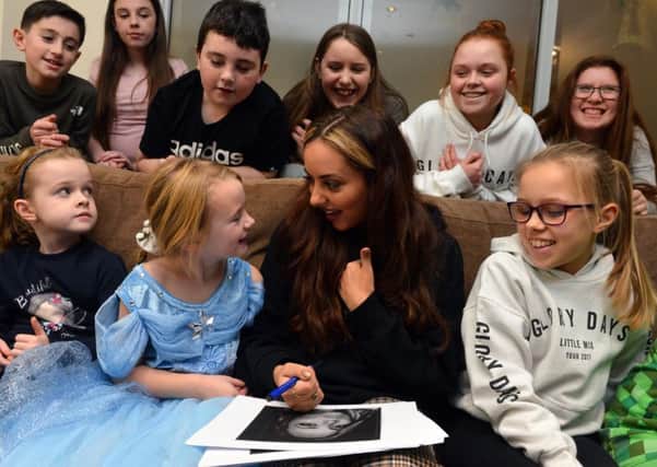 Little Mix star Jade Thirwall visits youngsters at Cancer Connections in South Shields.