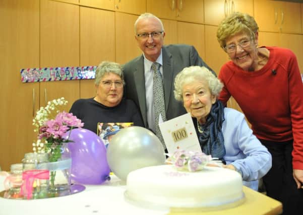 Celebrating her 100th birthday Peggy Carson, with step daughter Jean Turnbull, Ian Turnbull, and stepdaughter Anne Brown.
