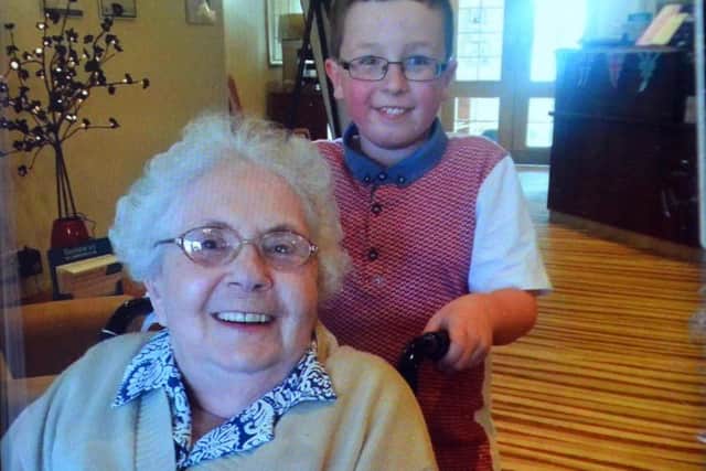 Tyler Lopes with his grandmother Ruth Lone