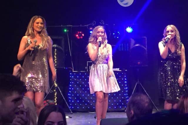 Elle on stage as they held a night of entertainment to raise funds for Marie Curie Cancer Care.
