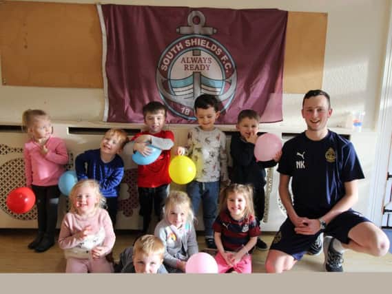 South Shields Football Club's Nathan Kew with youngsters at Beach Hill Nursery.