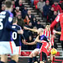 Danny Hylton saw red after an elbow on Jack Baldwin.