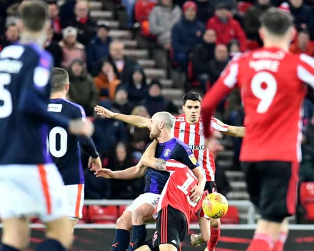 Danny Hylton saw red after an elbow on Jack Baldwin.