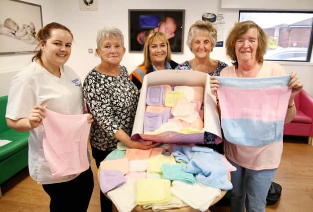 The group recently delivered their knitted gifts to the Special Care Baby Unit at the Queen Elizabeth Hospital in Gateshead.
(L-R) Lisa Wheatley from the Special Care Baby Unit, Thelma Ramm, Jackie Carr, Resident Liaison Officer at ENGIE, Margaret Woodthorpe and Linda Pennock.