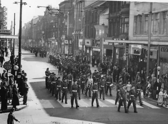 Members of the 1st Cadet Battalion DLI marching in King Street, followed by members of the Civil Defence and South Shields Police. in 1958