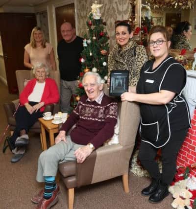 Westoe Village Residents with a donation of a £500 tablet to Westoe Grange care home thanks to money raised at the Westoe Village Fete. Pictured are Julie Faley Ascot Care, Nigel McMann chair of Weston village residents, Alison Mason Weston village residents secretary, Afton Bell activities manager, and care home residents Maude Jones and Norman Ford. Picture by Tom Banks.