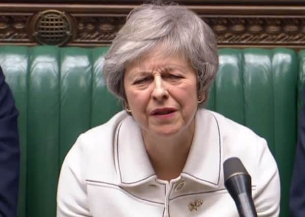 Prime Minister Theresa May listens as Labour leader Jeremy Corbyn responds to her latest statement issued on Brexit.