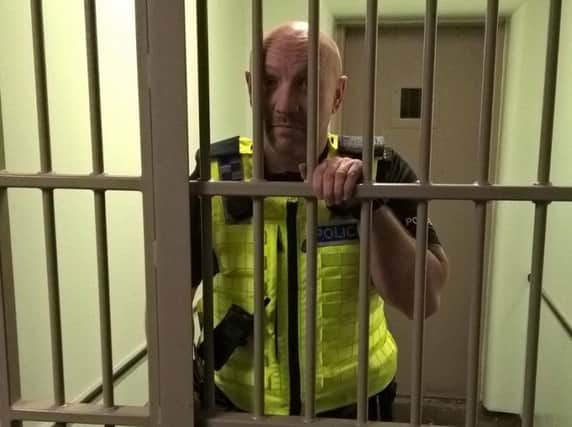 Pc Darren Lant is set to check into a haunted cell for the night to raise funds for charity.