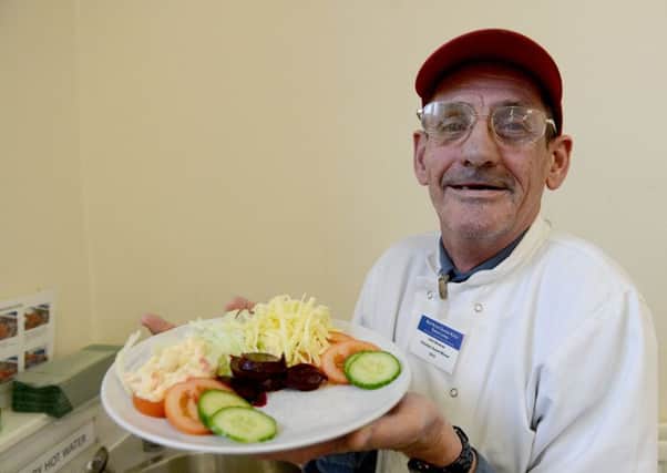 John Brennan with a Salad he prepared in the kitchen at the Action Stations community cafe, South Shields. Picture by FRANK REID