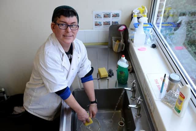 Steven Peterson (62) washing up in the kitchen of the Action Stations community cafe, South Shields. Picture by FRANK REID