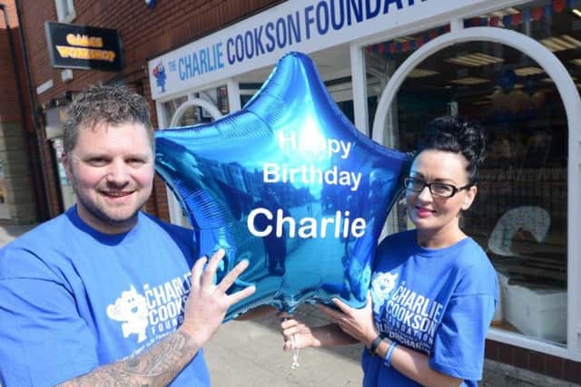 Chris and Sarah Cookson at the opening of the latest Charlie Cookson Foundation charity shop in 2017.