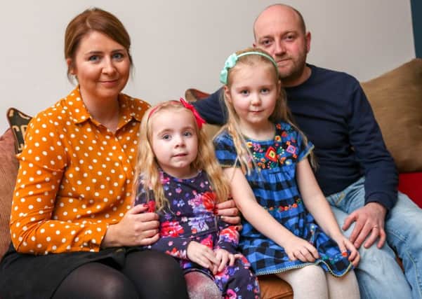 Harriet Corr, 4, who suffers from Cystic Fibrosis. with mum Emma, big sister Nancy and dad Chris.