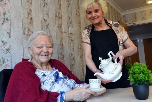 Residents Freda Fisher, left, and and Olive Lavery at the new cafe