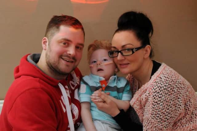 Chris and Sarah Cookson with first son Charlie
