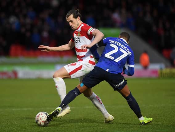 Doncaster striker John Marquis is the top scorer in League One this season with 16 goals.