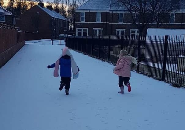 Snow in South Tyneside. Leon and Lydia. Picture: Cheryl Clark.