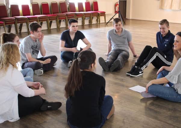 Fiona Martin with members of The Customs House Youth Theatre in rehearsals in 2016.