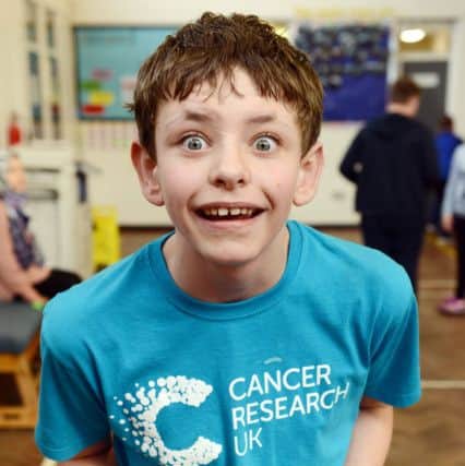 Epinay School pupil Adam Duffy enjoying taking part in Zumba for World Cancer. Picture by FRANK REID