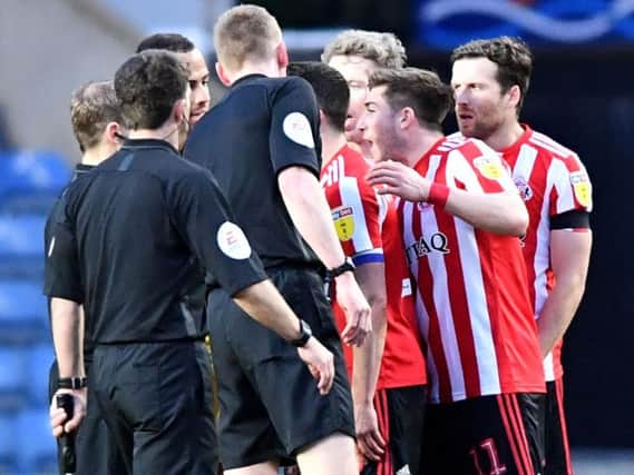 Angry Sunderland players at the final whistle.