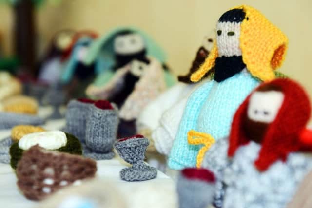 A scene from the last supper as part of the Knitted Bible display depicting Bible stories.